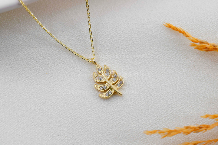 Monstera Leaf Diamond Pendant Necklace With Tropical Charm by silvergoldandrose